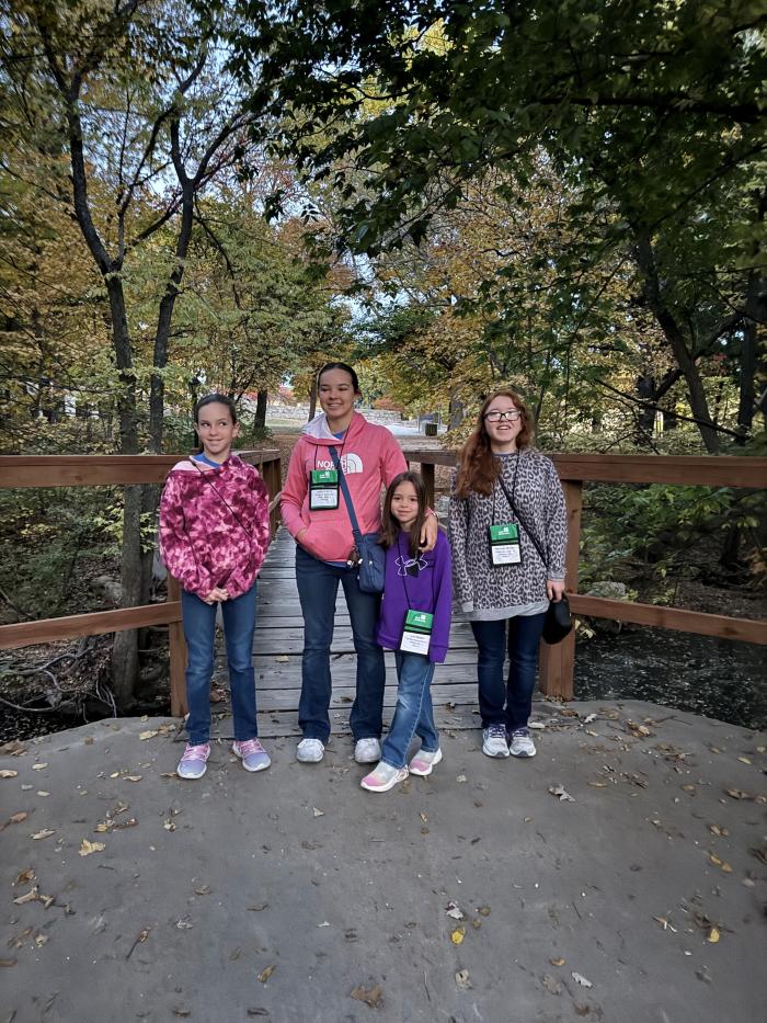 Julia, Lydia, Izzy and Hannah Walker are pictured at the 2023 Dog Conference. Julia, Lydia, and Hannah have all been Rock Springs 4-H Campers.